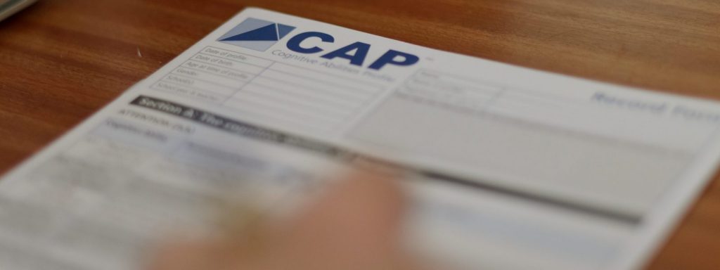 An image of a CAP record form lying on a table